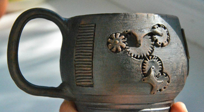 Pottery tea cup